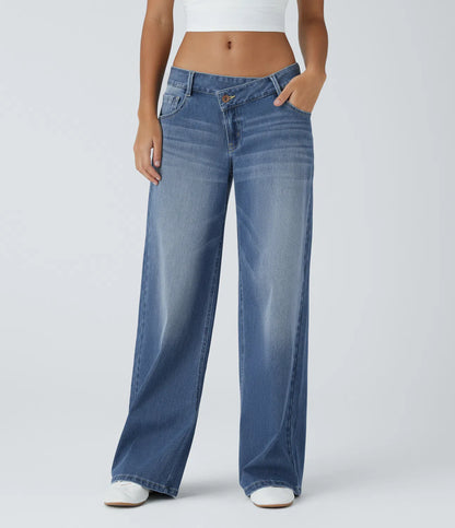 Jeans anchos de cintura baja, bolsillos con cremallera asimétricos, acabado lavado