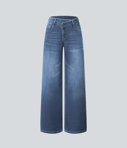 Jeans anchos de cintura baja, bolsillos con cremallera asimétricos, acabado lavado