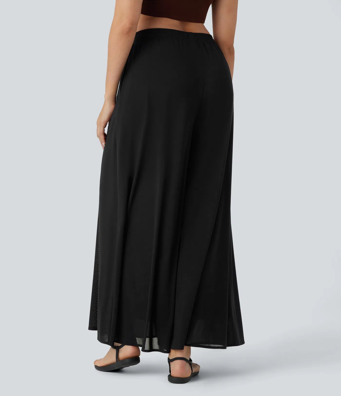 Pantalones relajados de talle alto, con bolsillos y sobreposición de malla, de pierna ancha