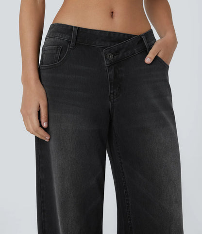 Jeans anchos de cintura baja, bolsillos con cremallera asimétricos, acabado lavado