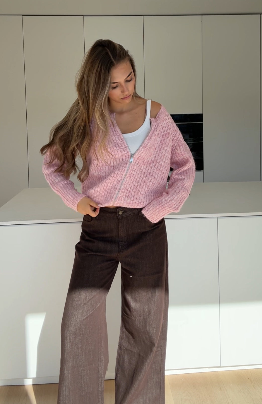 CARDIGÁN DE PUNTO ZIP ROSA