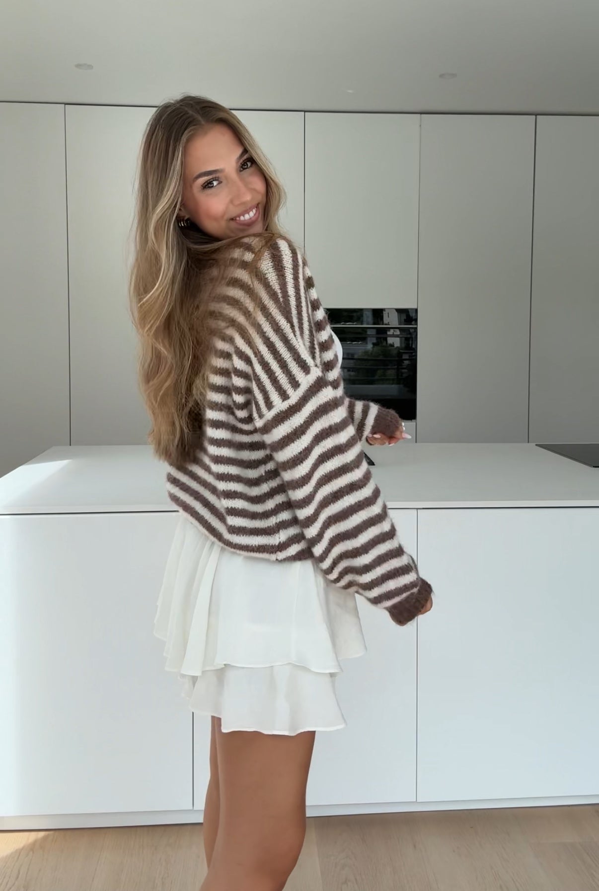 CARDIGÁN A RAYAS COLOR CHOCOLATE OSCURO