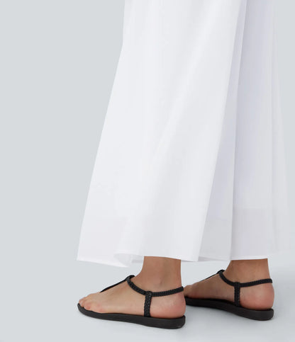 Pantalones relajados de talle alto, con bolsillos y sobreposición de malla, de pierna ancha