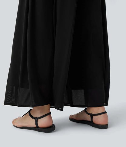 Pantalones relajados de talle alto, con bolsillos y sobreposición de malla, de pierna ancha