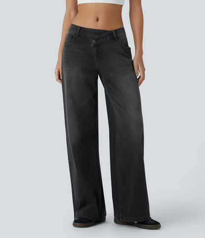 Jeans anchos de cintura baja, bolsillos con cremallera asimétricos, acabado lavado
