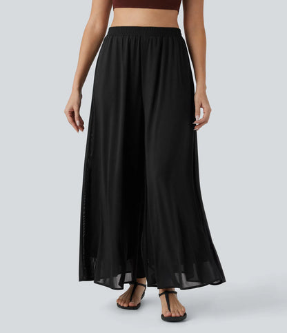 Pantalones relajados de talle alto, con bolsillos y sobreposición de malla, de pierna ancha