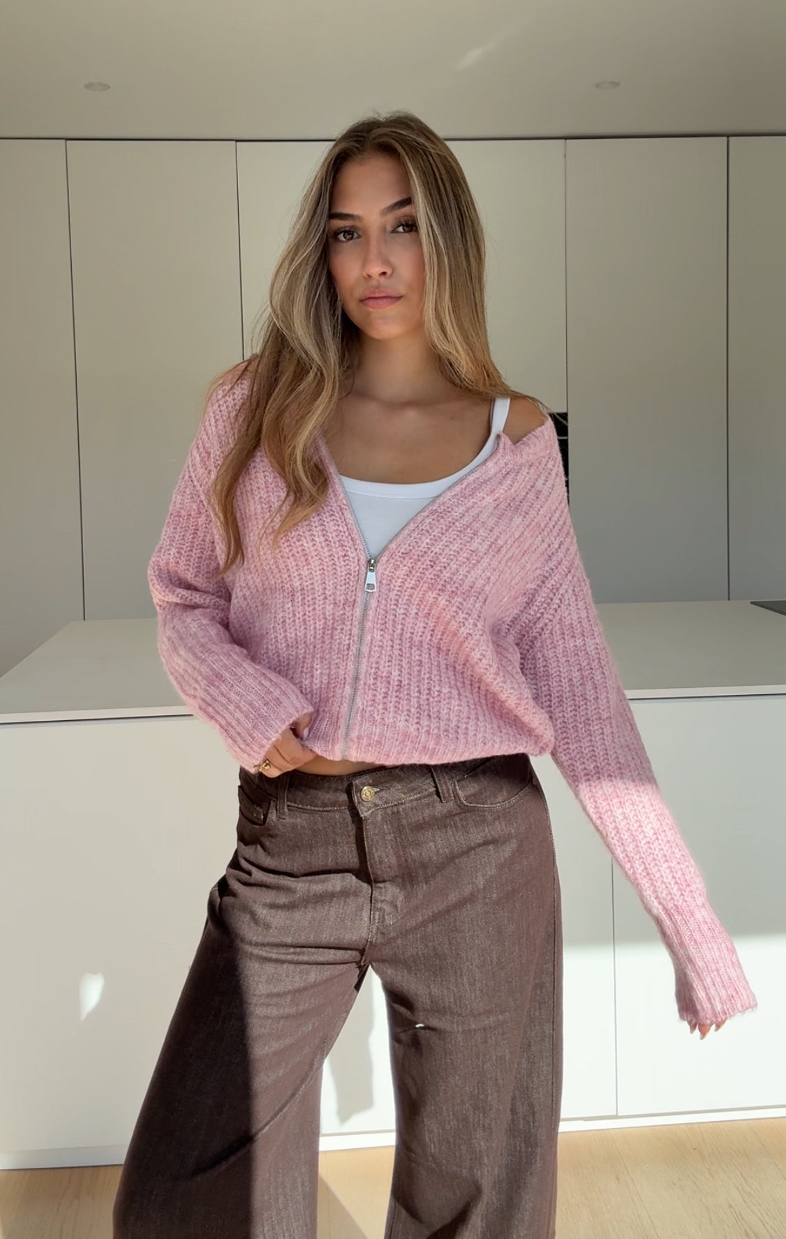 CARDIGÁN DE PUNTO ZIP ROSA